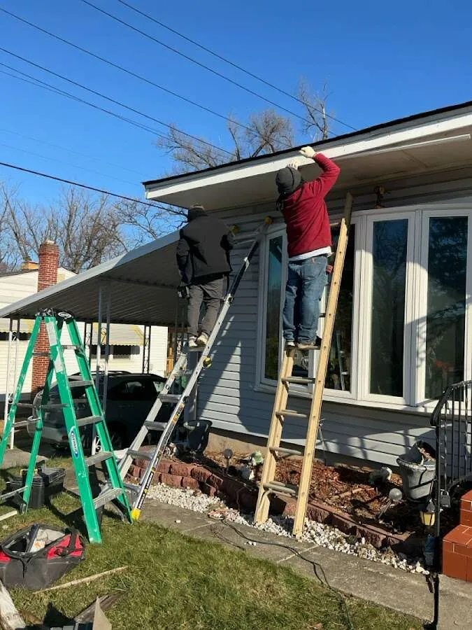 Restoration crew performing exterior repair in New Sewickley